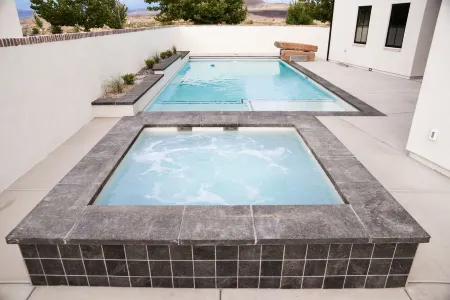 Black Ridge Villa near Sand Hollow & Zions. Sleeps 32. Private pool & hot tub.