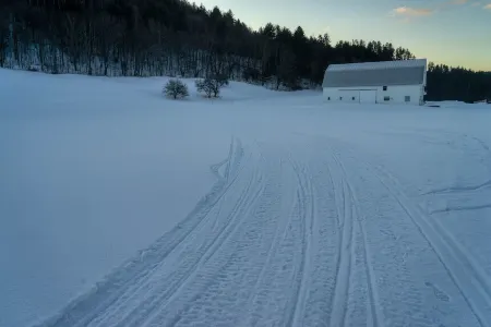 Easy access to VAST snowmobile trail system and local mountain bike trails