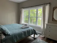 Beautiful new modern cabin with 100 feet of shoreline on Long Lake