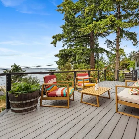 Darling pink beach house with epic views in a cozy community.