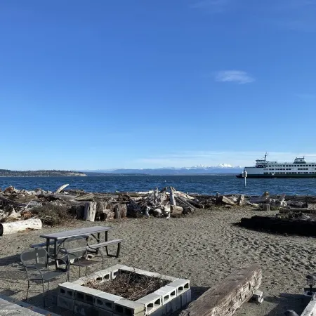 Beach house with views of Puget Sound, ferry, North Cascades, Mt Baker, Rainier.