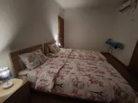 An apartment in a complex in a pine forest