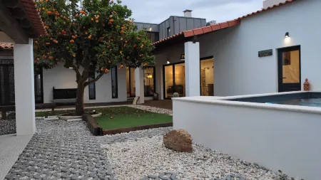 Laranjeira Das Loiras Отели рядом с достопримечательностью «Praia D'El Rey Golf Course»