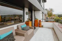 Stunning Lake and Mountain Views with Hot Tub - Modern Oasis Retreat