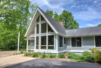 Stone Fireplace and Scenic Outdoor Spaces - Charming Mountain Chalet