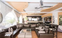 Coralli Apartments - bar