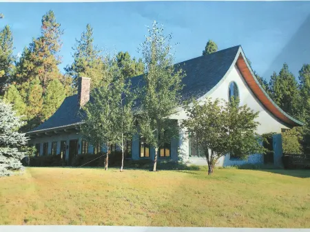 Timeless architecture, on 20 rolling  acres, just minutes from  Bigfork village.