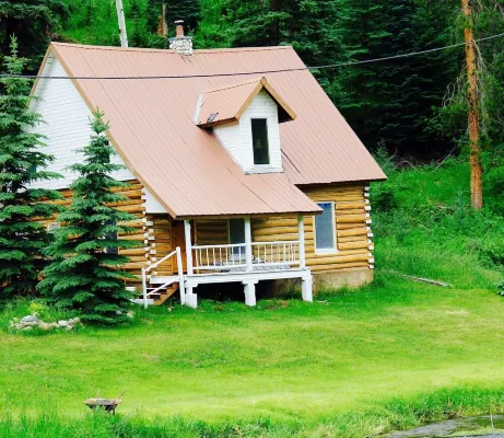 Lena's Cabin in Vail is nestled right beside Gore Creek,  minutes from skiing.