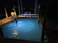 Newly Remodeled Home with Pool on the Harbor with a Beach view an a 22x40 dock. - Pools