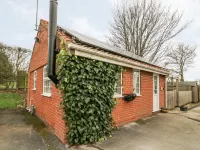 Wee Woody Hotels near Saint John of Beverley Catholic Church