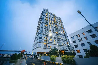 Tamansari Mahogany Apartemen by 7Rm Hotel dekat The Grand Outlet - East Jakarta