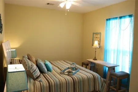 Beach house - Canal and Bay Views, Outdoor area with Hot Tub - Pet Friendly