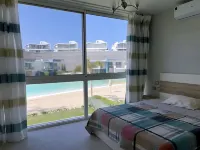 Elegant 4-Bedroom Beachfront Chalet with WiFi & AC in Beautiful Fouka Bay