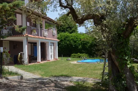 Just outside Rome.  Apartment in a villa, with swimming pool.