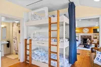 Charming Seaside Cottage  Sleeps 9 with WiFi, AC, 2 Min Walk to a Private Beach