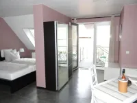 Quiet, spacious and light-flooded apartment/loft with large courtyard garden