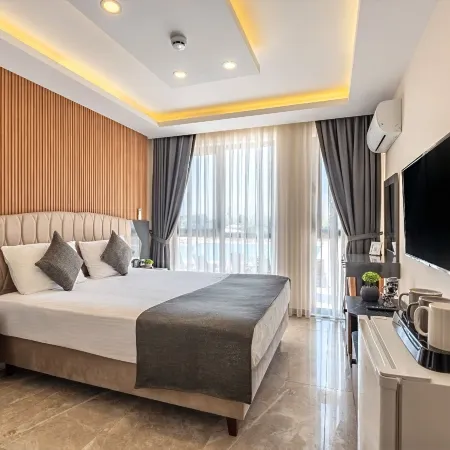 Laristone Suite Spa Hotel Отели рядом с достопримечательностью «Пляж Кадрие»