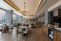 Higashiyama Niseko Village, a Ritz-Carlton Reserve - servizio colazione