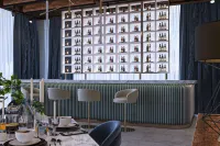 Royal M Al Aqah Beach Resort by Gewan - bar