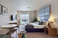 Astral Nirvana Suites- Half Board