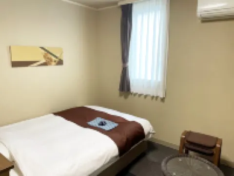 Hotel Takako Hotel berhampiran Tsurugajo Castle