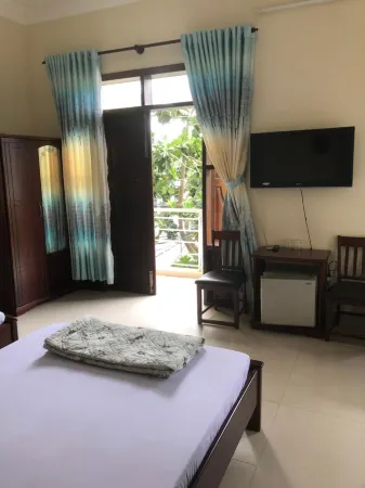 Quoc An Hotel Отели в г. Phuoc Tinh