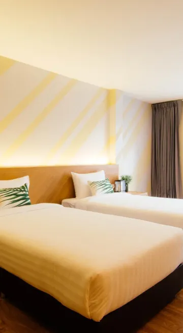 ห้องดีลักซ์เตียงใหญ่หรือเตียงแฝดพร้อมวิวทะเล