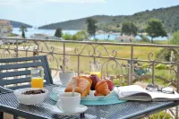 Stork Holiday Apartments - Garden & Sea View Hotels in Vivari