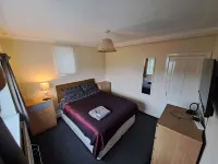 Woodard House Hotels near Vision Express Opticians at Tesco - Bidston Moss