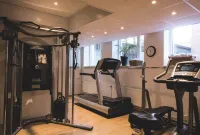 Home Hotel Uppsala - Phòng tập thể hình
