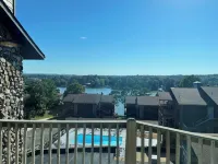 Paradise Found: Condo Oasis Reveals Stunning Pool and  Lake Views