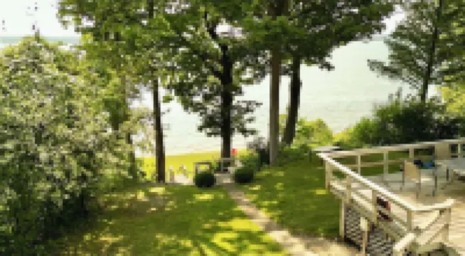 Seven Oaks — Lakefront Cottage on Owasco Lake — Large Beach with Stunning Views