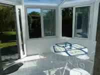 Blue longere by the sea