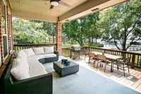Bright, open concept, lakefront house on open water with amazing sunset views!