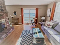 Enjoy the stunning views while relaxing on the deck at East Ledge Cottage