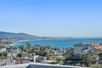 * Ocean view rooftop* Peloton* Modern & New