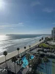 Beach and city views in condo with backyard access to beach and walkable town.