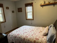 Relax at Grandma’s house with a screened in porch overlooking a private lake!
