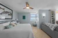 Fully Renovated Beachfront Condo Overlooking a Beach Sanctuary