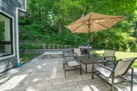 AMAZING NEWER HOME WITH LAKE VIEWS, steps away from shops and restaurants.