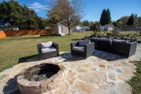 Charming Modern Home with Koi Pond & Spacious Backyard – Sleeps 6 Hotels near Walter Bickett Stadium