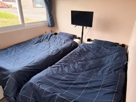 58 Village Tanegashima Отели рядом с достопримечательностью «Nishinoomote port offshore Breakwater north Lighthouse»