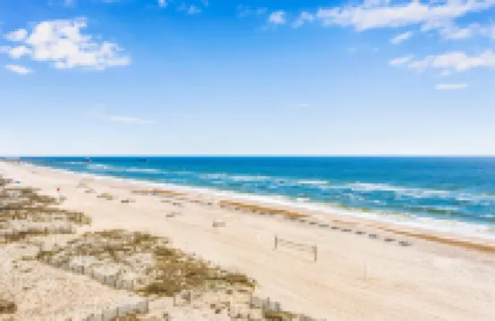 6th-floor condo with pool, central A/C, free WiFi, balcony, & views