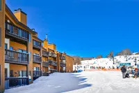 Ski-in/out mountainside condo with balcony, washer/dryer & high-speed WiFi Hotels in Ludlow