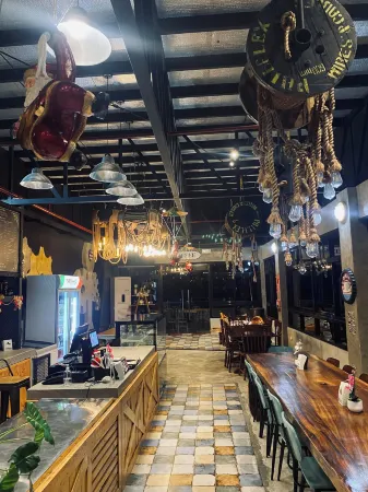 Aqua Frontier Hotel and Restaurant Отели в г. Лобо