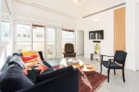 Bright 1Br Apartment w Balcony 10 Min Walk from Beach with Mamad by Sea N' Rent