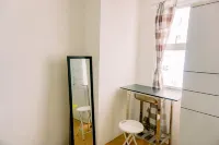 ห้องสตูดิโอในสไตล์ที่อบอุ่นและง่าย ๆ Urbantown Serpong Apartment