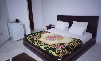 Quintessential Hotel & Suites by Badala