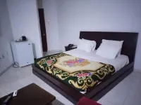 Quintessential Hotel & Suites by Badala