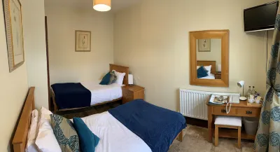 England's Gate and Coachhouse Hotels near Ford Bridge Church | St John of Jerusalem